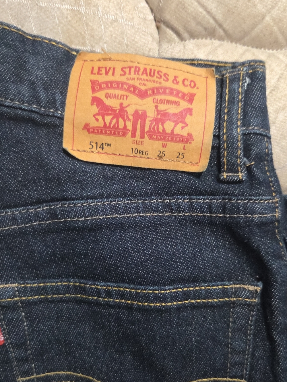 Levi's Dark Blue Slim Straight Jeans with Tan Patch